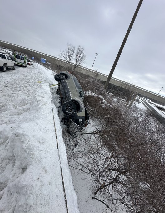 Car goes over guardrail in Niagara Falls, stops above QEW