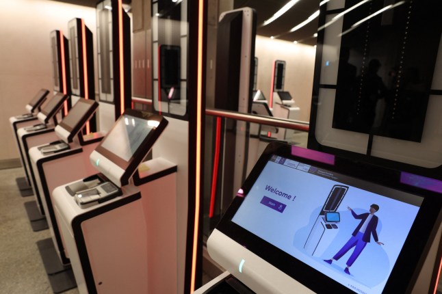 The EES kiosks where passengers can check in, are pictured at St Pancras International Train Station station in London, on September 22, 2025. The European Union's new border-check system for non-EU nationals, the so-called Entry/Exit System (EES), which will do away with passport stamps, is set to finally launch October 12. (Photo by Adrian DENNIS / AFP) (Photo by ADRIAN DENNIS/AFP via Getty Images)