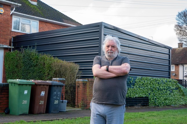 Pic shows Peter Loughlin, 74, his house is opposite the huge Ambulance shed on Aycliffe Road, Borehamwood,