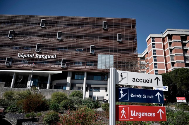 A picture taken on April 4, 2020 shows the entrance of the Rangueil hospital in Toulouse, southern France