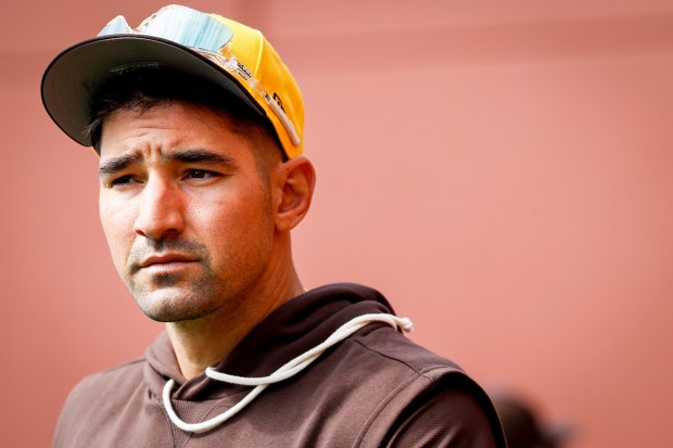 Nick Castellanos of the San Diego Padres looks on during spring training workouts at the Peoria Sports Complex on Sunday, Feb. 15, 2026 in Peoria, Ariz.(Meg McLaughlin / The San Diego Union-Tribune)