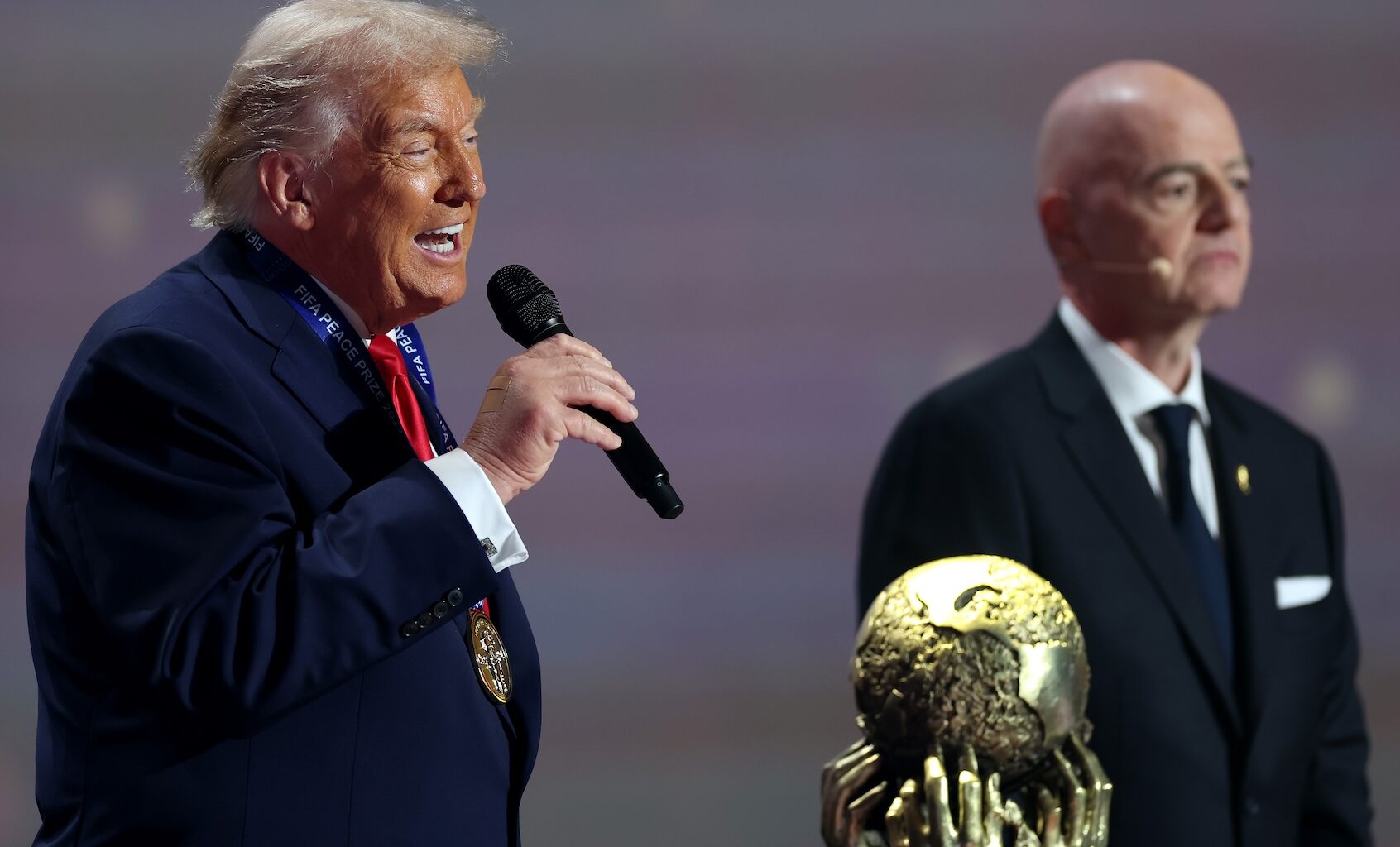 Donald Trump speaks as he receives the FIFA Peace Prize from FIFA president Gianni Infantino in Washington, Dec. 5, 2025. (Dan Mullan/Getty Images)