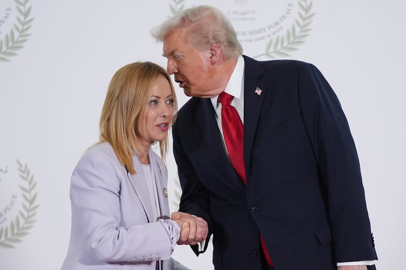 SHARM EL SHEIKH, EGYPT - OCTOBER 13: U.S. President Donald Trump (R) greets Italy's Prime Minister Giorgia Meloni during a summit of European and Middle Eastern leaders on October 13, 2025 in Sharm El Sheikh, Egypt. President Trump is in Egypt to meet with European and Middle Eastern leaders in what’s being billed as an international peace summit, following the start of a US-brokered ceasefire deal to end the war in the Gaza Strip.