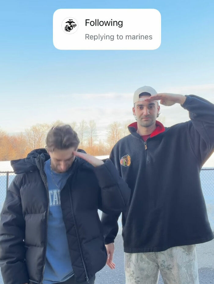 Two Canadian hockey fans outdoors saluting with no sympathy after bold Olympic bet backfires on USA gold win.