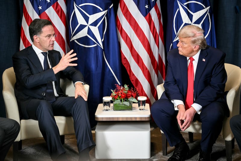 President Donald Trump (R) speaks with NATO's Secretary-General Mark Rutte during a bilateral meeting on the sidelines of the World Economic Forum (WEF) annual meeting in Davos on January 21, 2026.