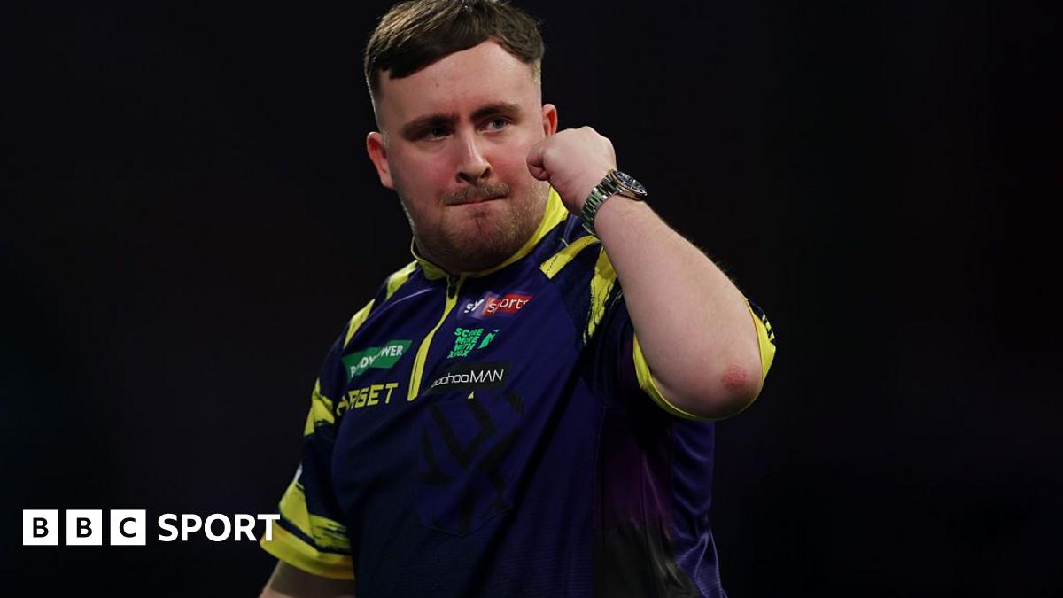 Luke Littler celebrates at the World Darts Championship