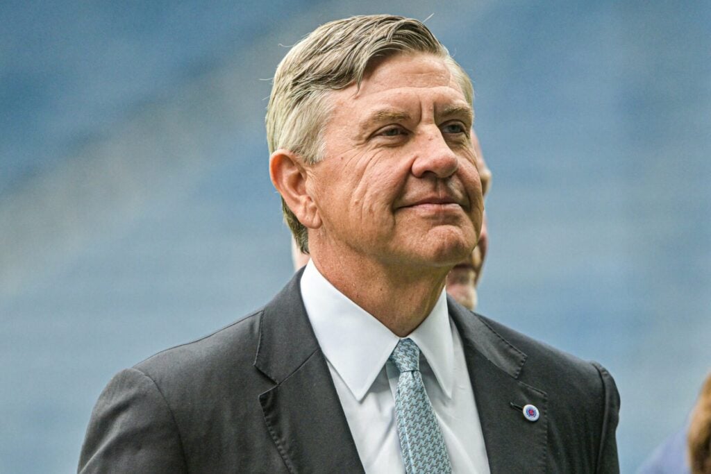 Rangers chairman Andrew Cavenagh smiles at Ibrox