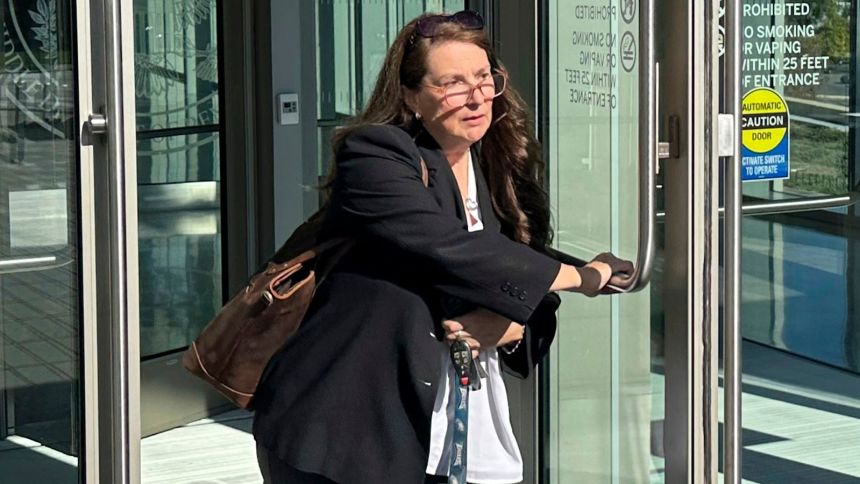 Heather Honey, who was a conservative election researcher at the time, leaves the federal courthouse in Harrisburg, Pennsylvania, October 18, 2024.