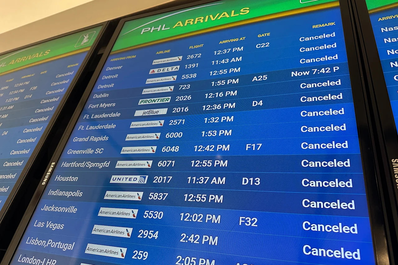 Canceled flights are displayed on the Arrivals board at the Philadelphia International Airport on Feb. 23 in Philadelphia. 