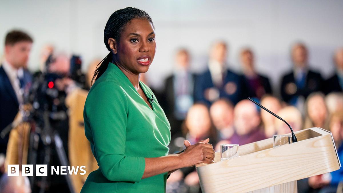 Rachel Reeves is seen in closeup in a red top.
