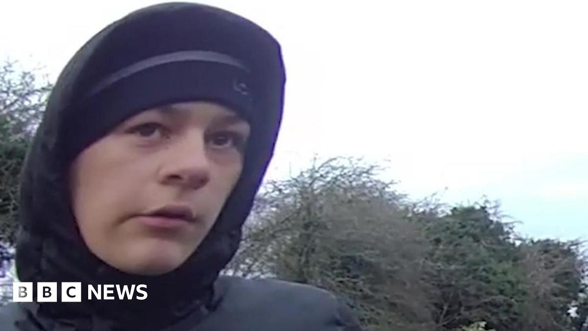 A police mugshot of Kian Moulton, who has dark brown hair, which is curly on top