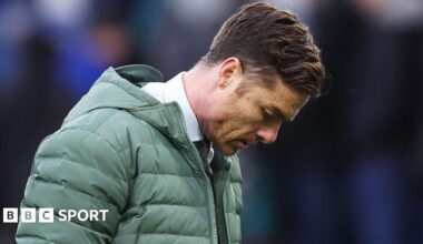 Scott Parker looking at the floor