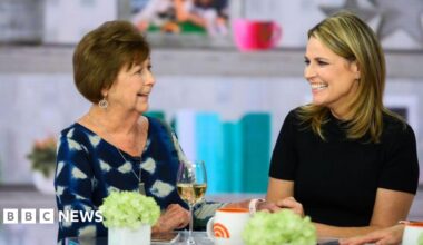 Savannah Guthrie (right) and her mother Nancy Guthrie (left) sit together at a table on the set of the TODAY Show.