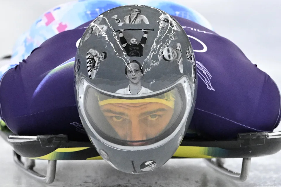 Ukraine's Vladyslav Heraskevych takes part in the skeleton men's training session at Cortina Sliding Centre during the Milano Cortina 2026 Winter Olympic Games in Cortina d'Ampezzo on February 11, 2026. (Photo by Tiziana FABI / AFP via Getty Images)