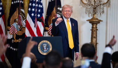 President Donald Trump -- shown at a Black History Month reception at the White House on Wednesday -- is, like the rest of Washington, awaiting the Supreme Court's tariff decision.