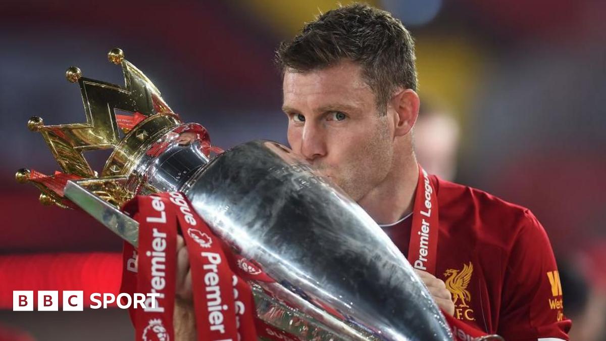 James Milner kisses Premier League trophy