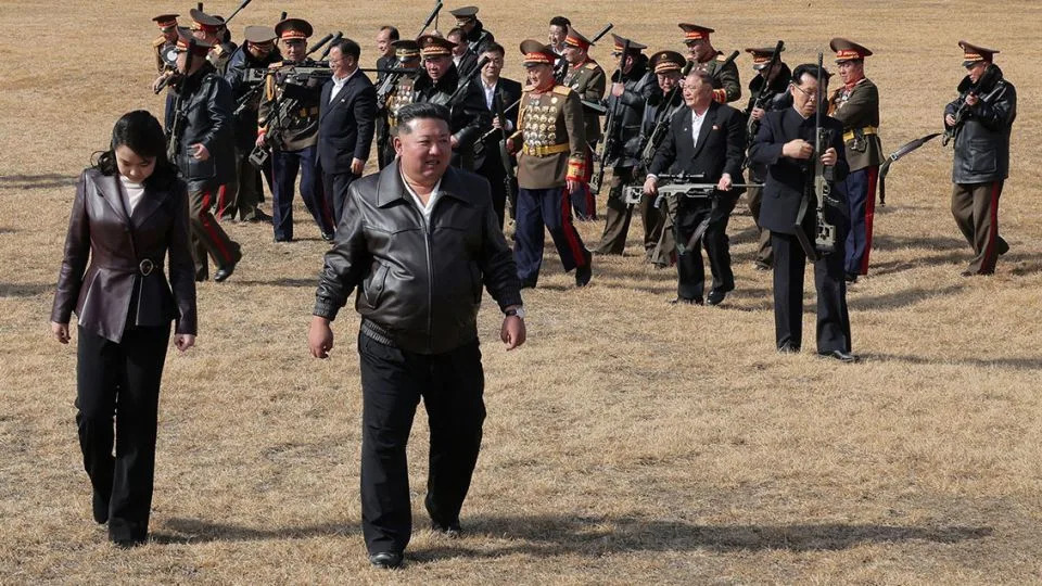 North Korea's KCNA news agency shows leader Kim Jong Un (R) and his daughter Kim Ju Ae heading to the shooting range, at an undisclosed place in North Korea. - KCNA VIA KNS/AFP/Getty Image