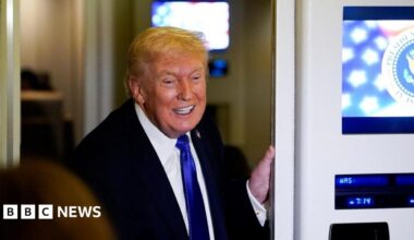 USS Abraham Lincoln in the Arabian Sea and satellite image of the aircraft carrier
