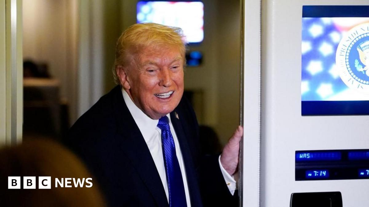USS Abraham Lincoln in the Arabian Sea and satellite image of the aircraft carrier