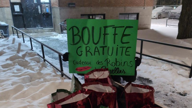 Thieves dressed as Robin Hood give away stolen food to protest Canada’s rising prices