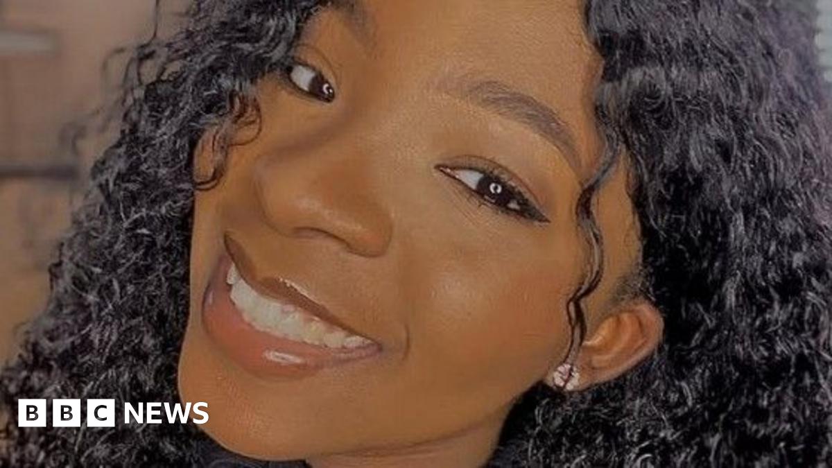 A close-up self of Ifunanya Nwangene. She is smiling and has long, curly hair