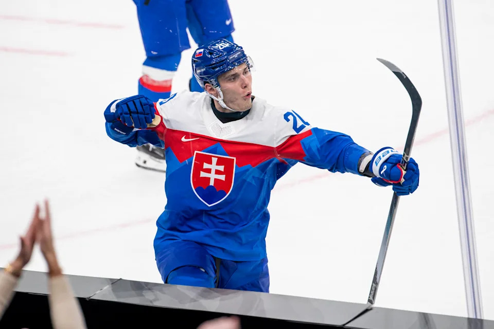 MILAN, ITALY - FEBRUARY 11: Juraj Slafkovsky #20 of Slovakia celebrates after scoring a goal during the Men's Preliminary Group B match between Slovakia and Finland on day five of the Milano Cortina 2026 Winter Olympic games at Milano Santagiulia Ice Hockey Arena on February 11, 2026 in Milan, Italy. (Photo by RvS.Media/Robert Hradil/Getty Images)