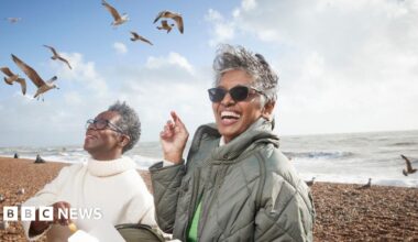 Patrick smiling in the studio as a guest on Ready to Talk