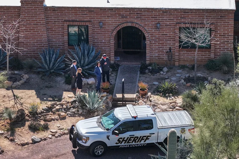 Authorities outside of Nancy Guthrie's Tucson, Ariz., home on Feb. 25, 2026Credit: Joe Raedle/Getty