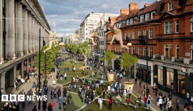 CGI of Oxford Street shows pedestrians walking on green pavement with trees and artwork above