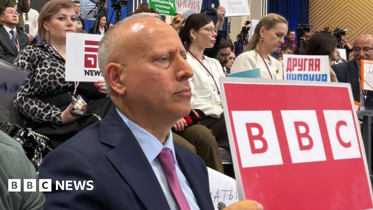 The BBC's Ben Tavener and Steve Rosenberg are seen in a close-up shot at Vladimir Putin's end of 2025 press conference.