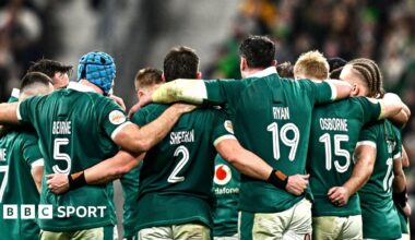 Image showing a split screen of France v Ireland and an advert for a mobile phone