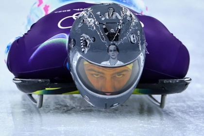 Ukrainian Skeleton Racer Uses Olympic Helmet to Spotlight Athletes Killed By Russia