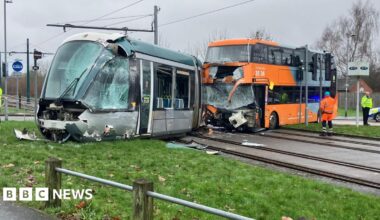 A crashed tram and bus