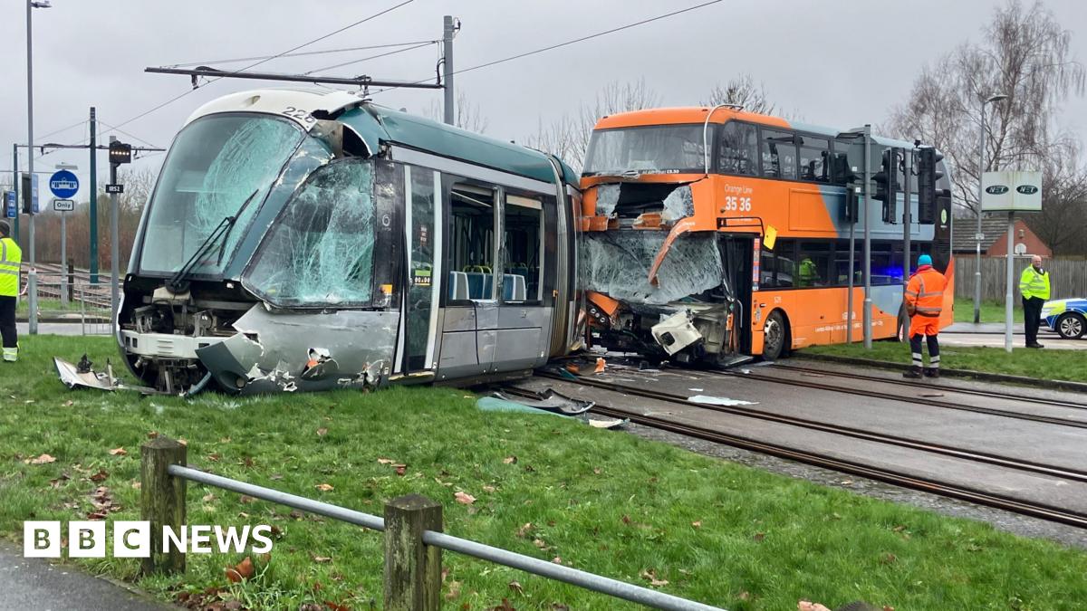 A crashed tram and bus