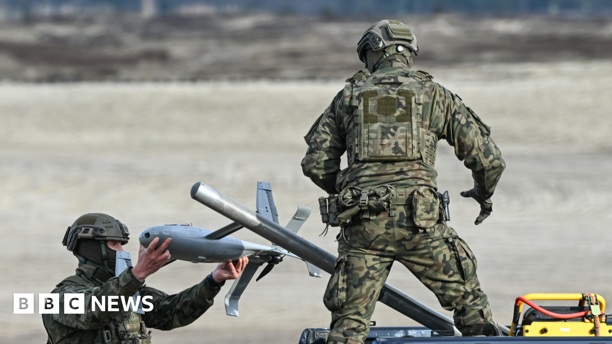 Polish Army soldiers prepare an interceptor drone during a live-fire demonstration in Poland in November 2025