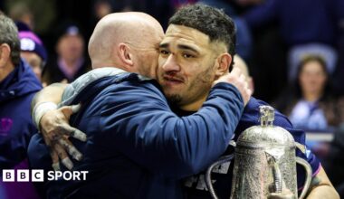 Scotland head coach Gregor Townsend embraces captain Sione Tuipulotu after their win over England