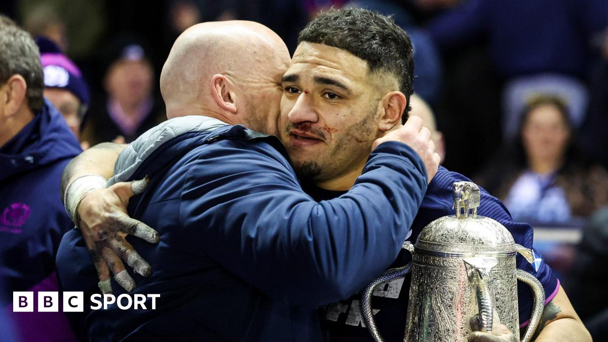 Scotland head coach Gregor Townsend embraces captain Sione Tuipulotu after their win over England