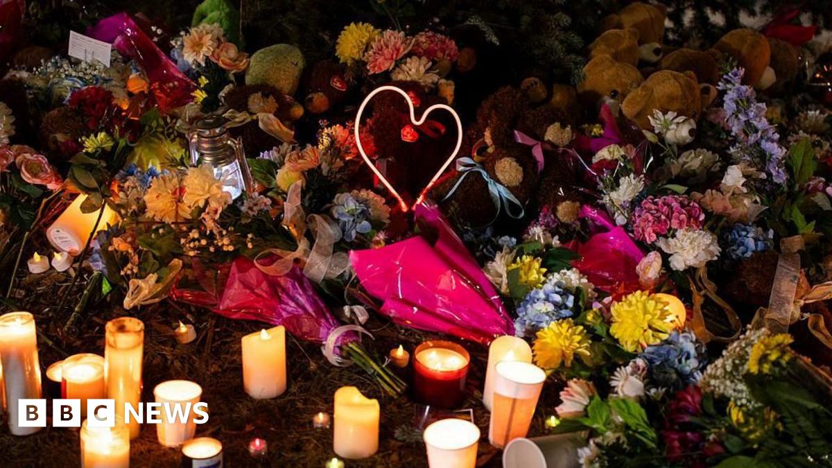 A map showing the small town of Tumbler Ridge as a satellite aerial shot. The location of the secondary school is marked on the map as well as the home where the suspect's family members were found. In the bottom left hand corner there is a map of Canada and the US with a mark showing Tumbler Ridge is in western Canada.