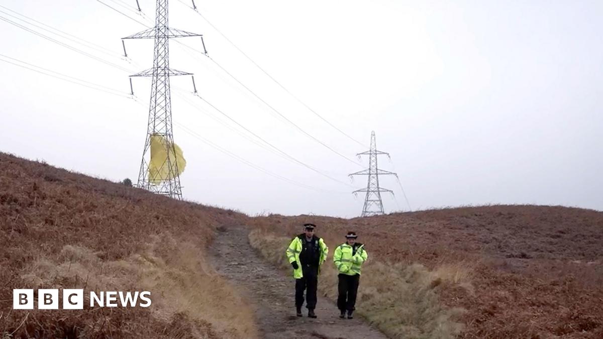 A red tube on a blue background - part of the parachute system which contains propellant.
