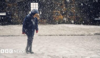 A met office weather warning map shows all of inland wales covered in a yellow area labeled yellow ice and another yellow area labeled yellow snow. the places shown are Swansea St Davids Pwllheli Bangor and St Asaph