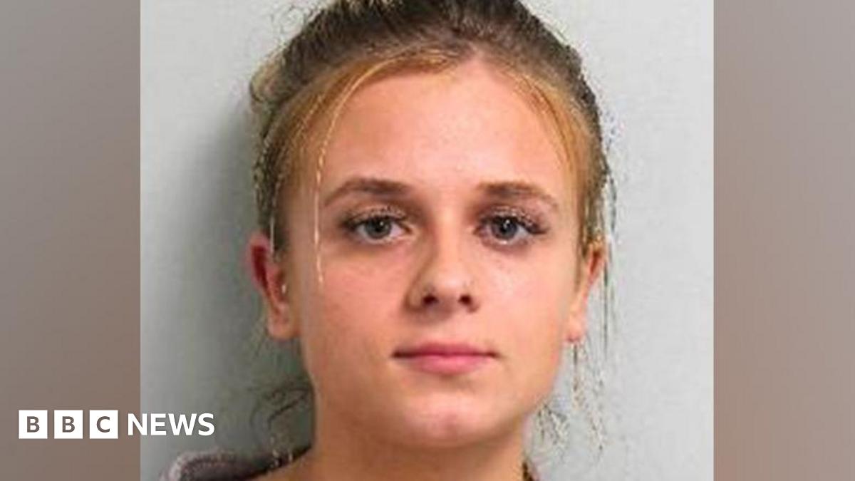 Custody image of Roksana Lecka. She is looking directly at the camera wearing a woollen type cardigan.