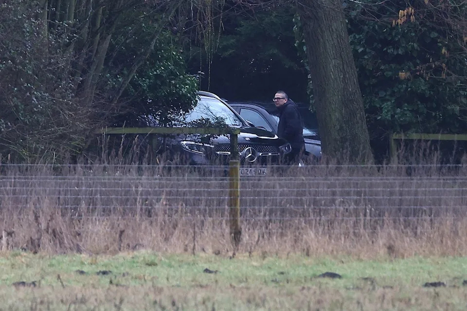 Cars at the Sandringham home where ex-Prince Andrew was arrested on Feb. 19, 2026 Peter Nicholls/Getty
