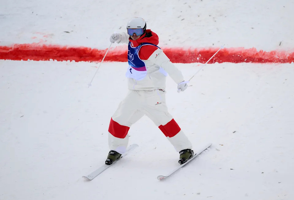 LIVIGNO, ITALY - FEBRUARY 12: Mikael Kingsbury of Team Canada reacts as he competes in Men's Freestyle Skiing Moguls Final 2 on day six of the Milano Cortina 2026 Winter Olympic games at Livigno Air Park on February 12, 2026 in Livigno, Italy. (Photo by David Ramos/Getty Images)