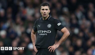 Rodri stands with his hands on his hips during Manchester City's game at Tottenham