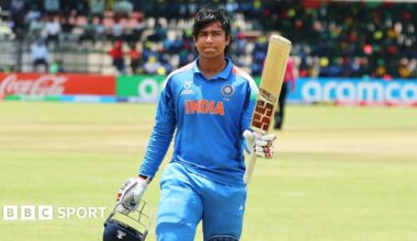 India's Vaibhav Suryavanshi walks off, saluting the crowd with his bat, after his incredible innings against England