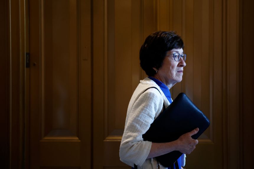 Sen. Susan Collins speaks with a reporter outside of the Senate Chambers during a vote at the US Capitol on June 20, 2024.