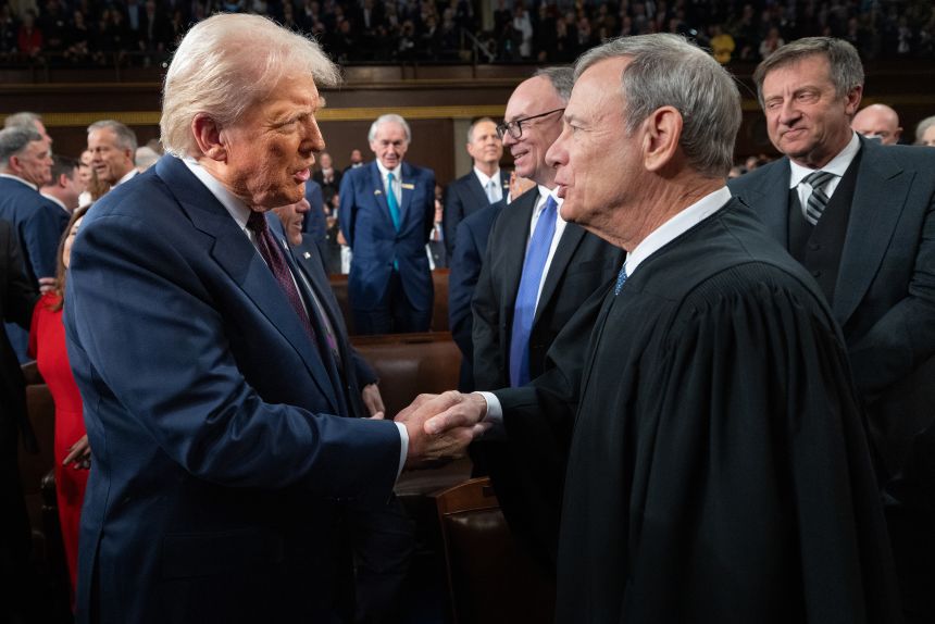 President Donald Trump greets Chief Justice of the United States John G. Roberts, Jr as he arrives to deliver an address to a joint session of Congress at the U.S. Capitol on March 04, 2025 in Washington, DC.