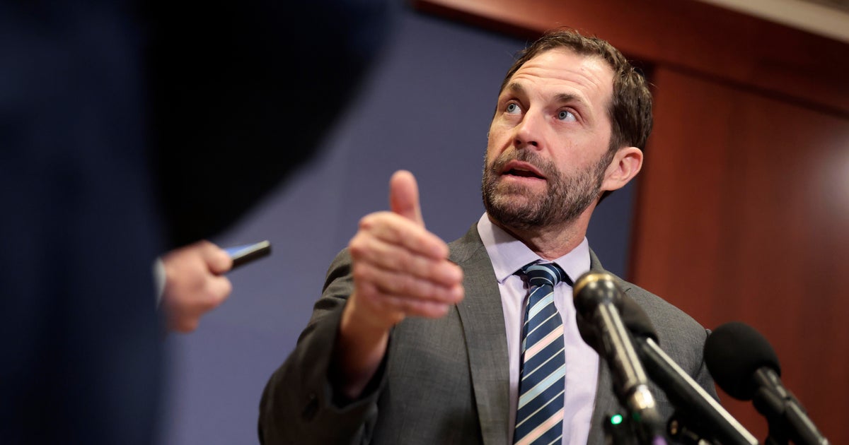 Rep. Jason Crow speaks to the media on Capitol Hill on Dec. 16, 2025 in Washington, DC.