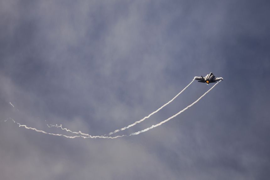 A Lockheed Martin F-35 Lightning II jet performs a flyover before the start of the Rolex 24 at Daytona International Speedway in Daytona Beach, Florida, on January 24, 2026.