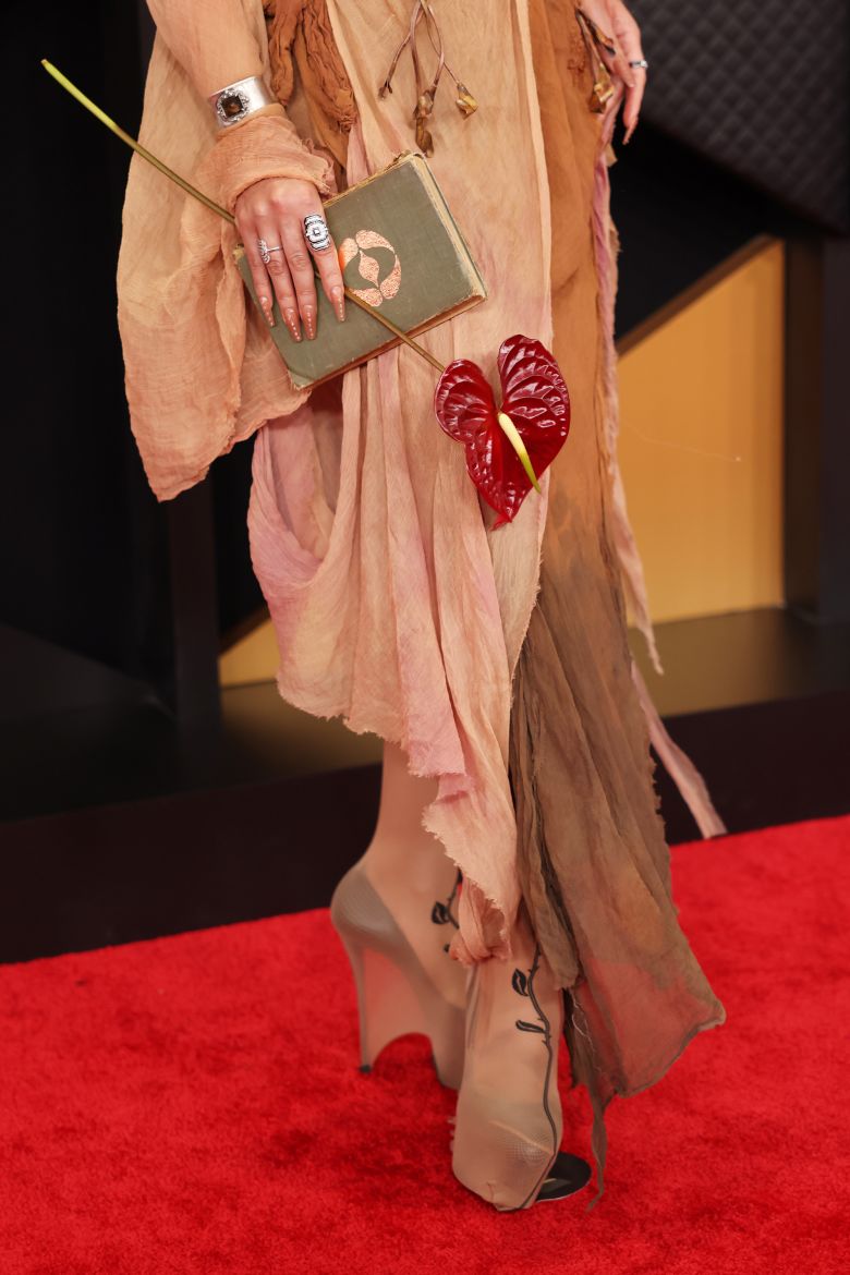 The singer accessorized with an anthurium flower, representing her early career, and a book — which, she told Variety, contained the “lore of 'Eusexua,'” her latest album.